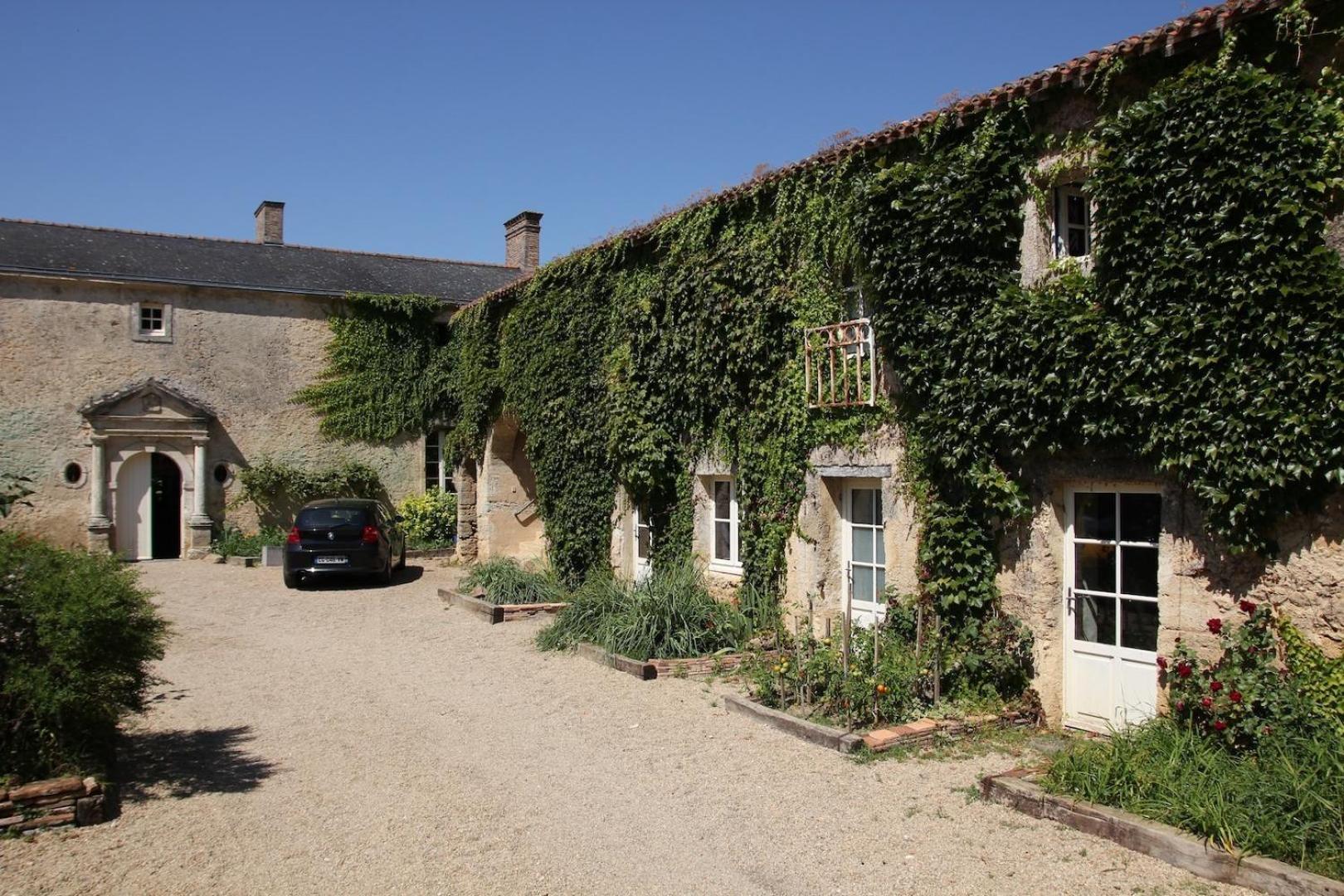 Le Manoir De Gatines Bed and Breakfast Tigné Eksteriør billede